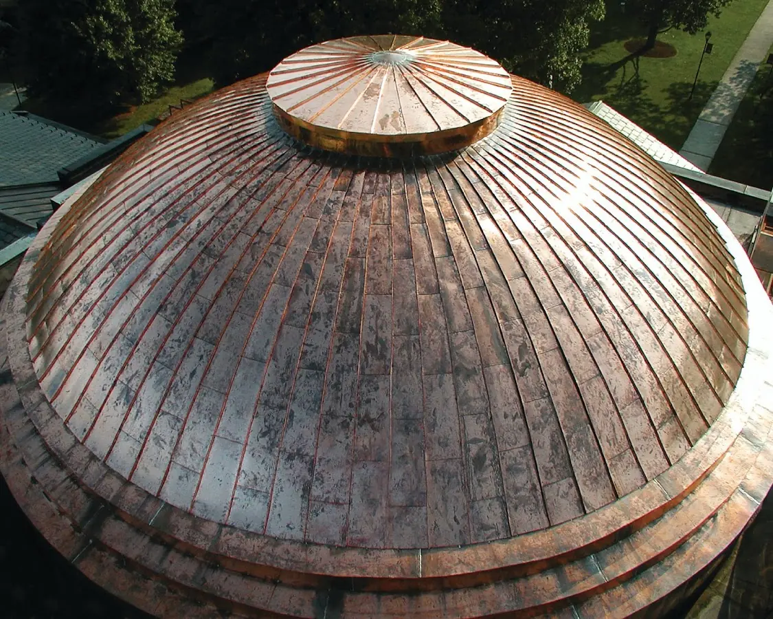 Craftsman Roofing crew installing a new roof in Purnell